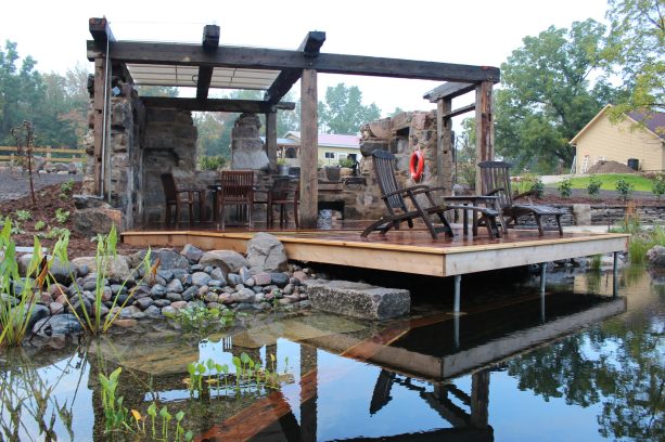 floating deck with a pergola in a faux ruin design