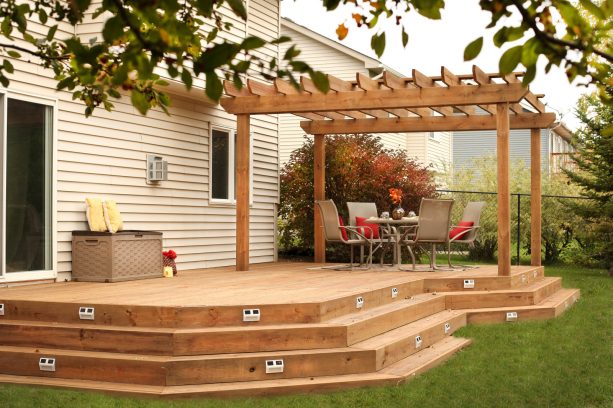 floating deck with a pergola made of treated cedar tone with solar-powered lights