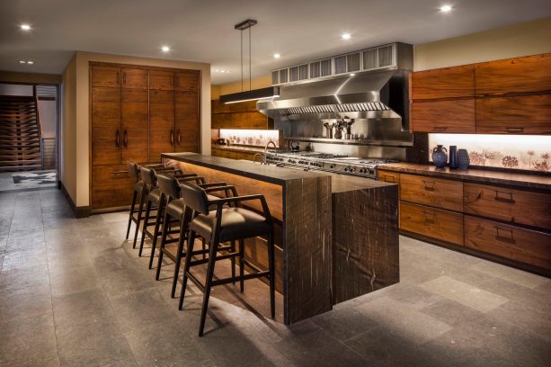 gray floor with brown cabinets in a contemporary kitchen
