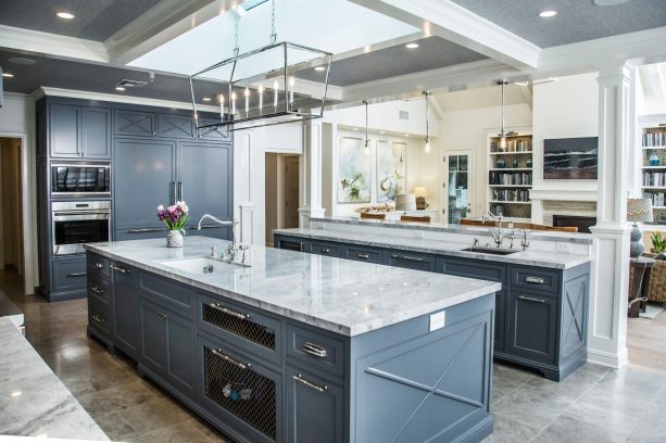 gray kitchen floor paired with dark bluish gray cabinets
