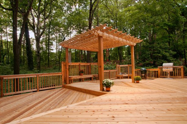 large floating deck with a pergola to secure a small spot as covered seating space