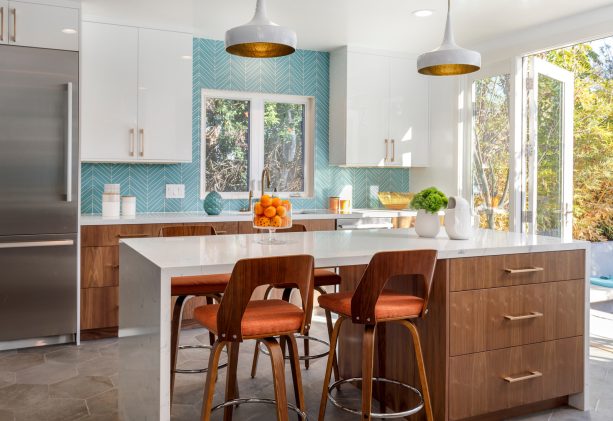pan american ceramics approach gray hexagon kitchen floor with two-toned cabinetry and blue backsplash