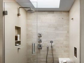 recessed beige-colored wall niche in the bathroom for toiletries