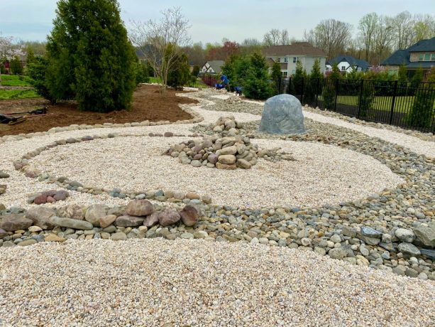 traditional rock garden without plants that creates a flow throughout the house