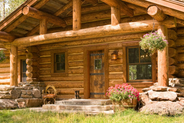 covered log cabin porch with minimalist seating