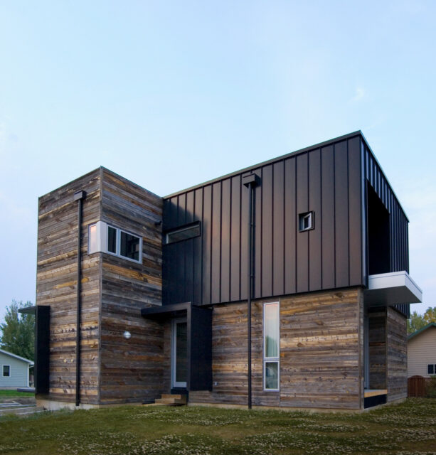 a combination of horizontal wood and vertical metal as a mixed siding material