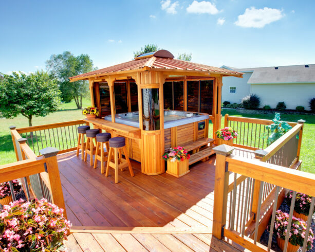 a combination of hot tub and a gazebo on a deck
