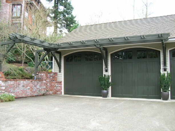 extended pergola over the garage door that covers the planter box too