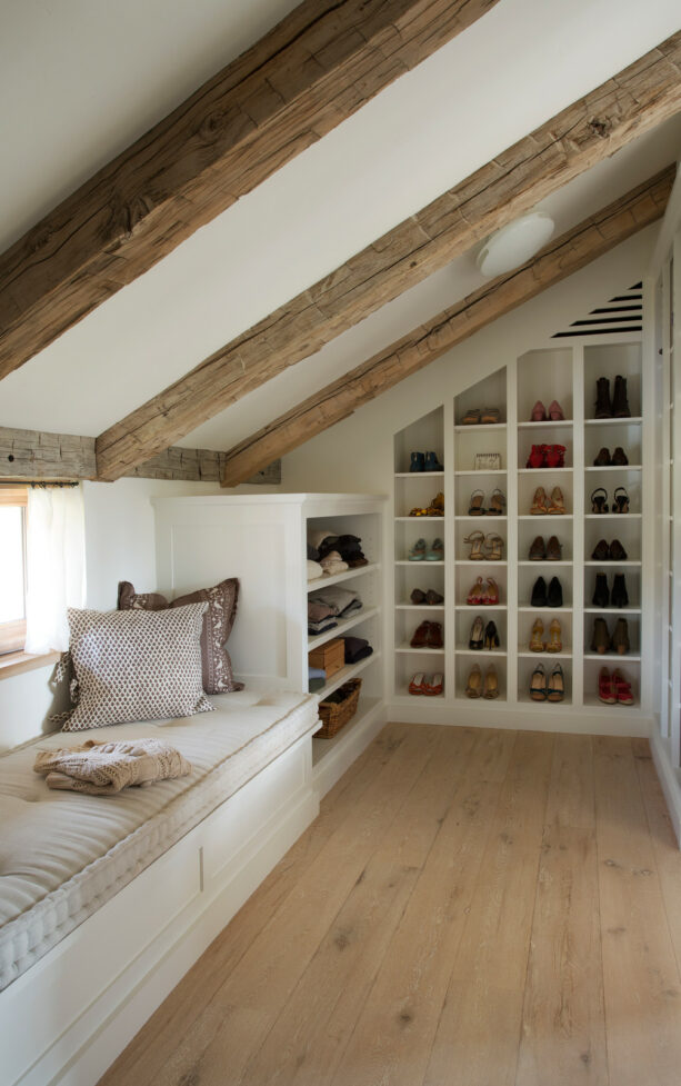 farmhouse style attic closet with shoe racks