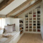 farmhouse style attic closet with shoe racks