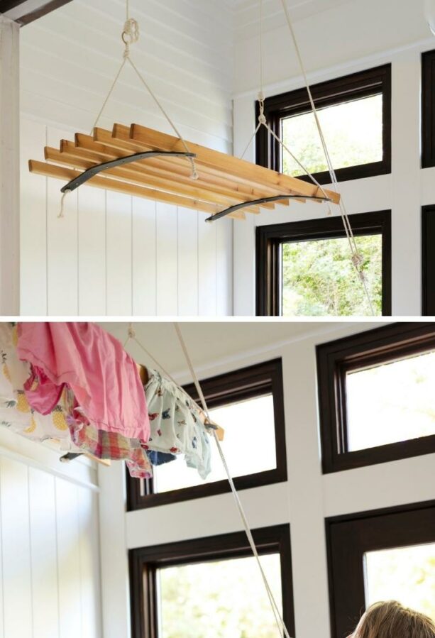 hanging clothes rack from the ceiling as an airer in a laundry room