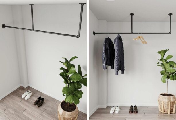 the hanging clothes rack from the ceiling attached to the wall is made of industrial pipes