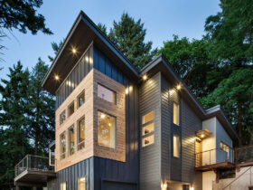 vertical standing seam metal siding in a dark gray color