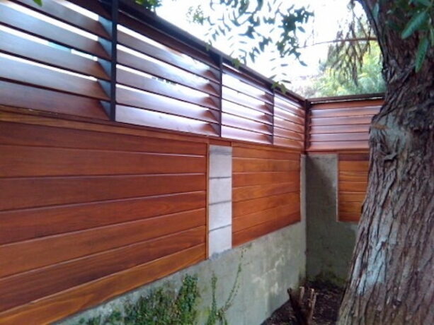 tight panel mid-century modern fence with louvers top
